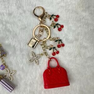 Louis Vuitton authentic charm on keychain bag charm CHOOSE ONE ONLY! Great gift!